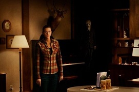Affiche du film the Strangers Affiche du film the Strangers