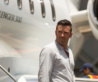 Une scène du film Runner Runner